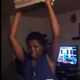 Boy holding books as punishment in YouTube video
Worldstarhiphop.com screenshot